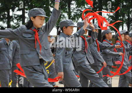 chinese girl dancing in military uniform