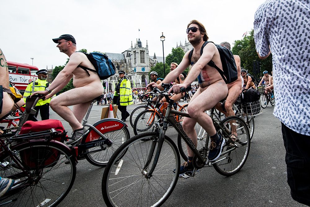 Best of Naked woman riding a bike